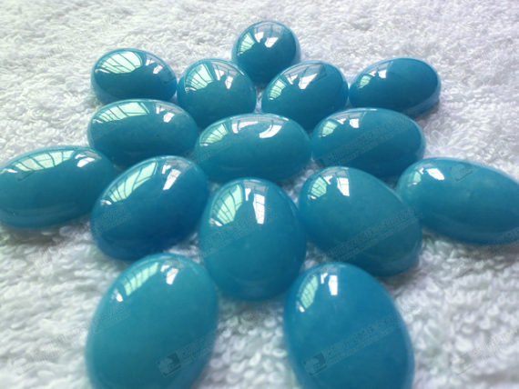 Dyed blue jade oval cabochon