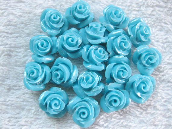 Synthetic blue turquoise flower carvings