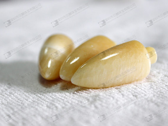 Semi precious beads yellow jade pike shaped 35x15mm