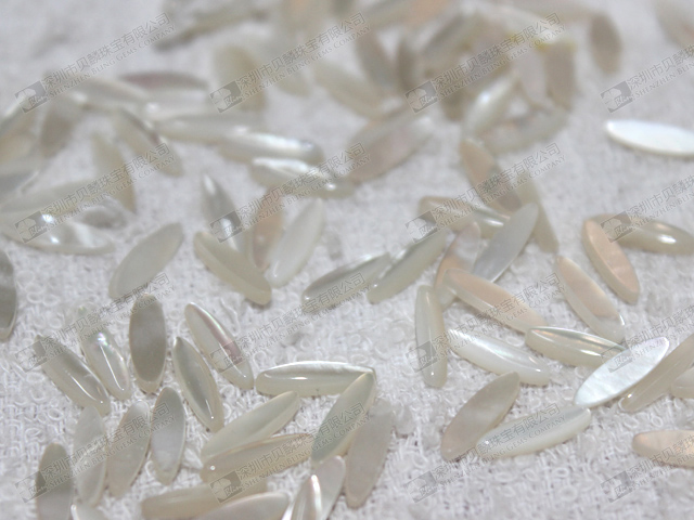 White MOP oval cabochons