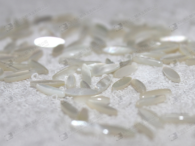 White MOP oval cabochons