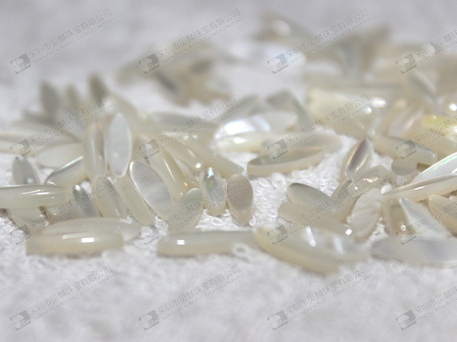 White MOP oval cabochons