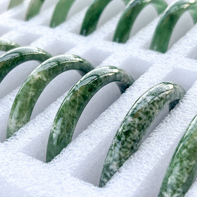 Green spot stone bangles