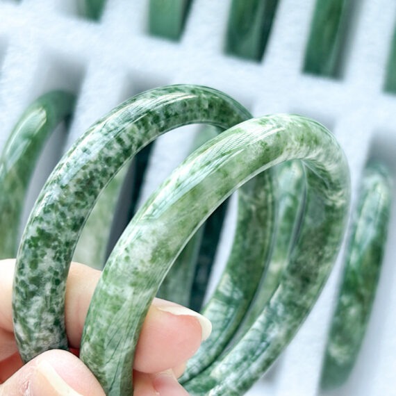 Green spot stone bangles