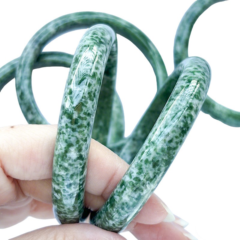 Green spot stone bangles
